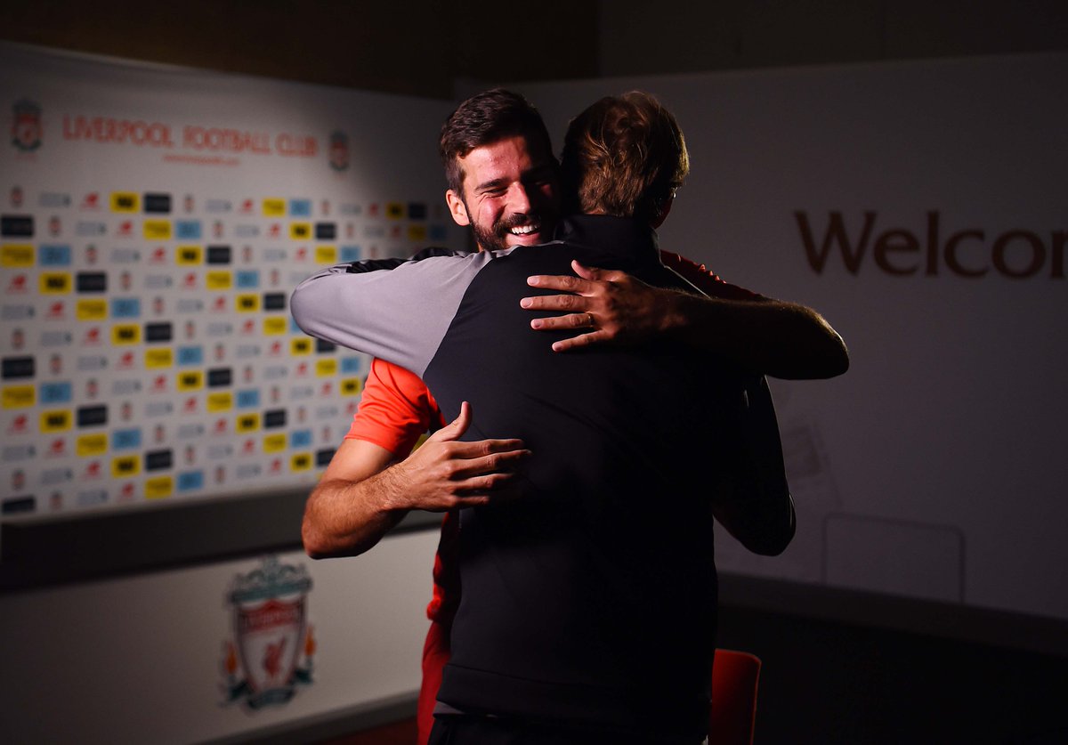 LFC's tweet photo. That first hug from the boss. 🙌 https://t.co/QTNDwBPOeG