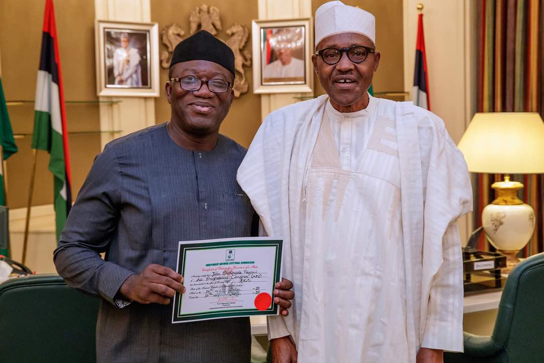 Ekiti State Governor-Elect, Dr <a href="/kfayemi/">Kayode Fayemi</a>, presents his Certificate of Return to President <a href="/MBuhari/">Muhammadu Buhari</a>.
#EkitiDecided