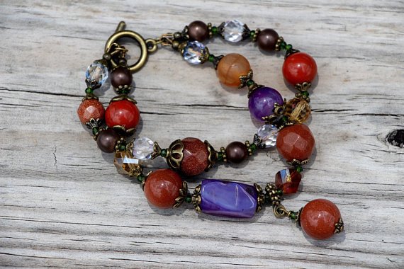 YuliaBaileY's tweet photo. Beautiful two strand Orange purple bracelet for women made from purple agate, red jasper, goldstone, and glass. 
#womenaccessories  #fashionjewelry #handmadejewelry #bohojewelry https://t.co/C4oteqtglX