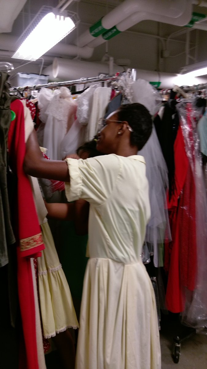 STAGEStheater's tweet photo. Exploring the costume shop while wearing one of her costumes.  Way to get in the zone, and into character.  #summerlearning #makered https://t.co/sX0fE2QXIk