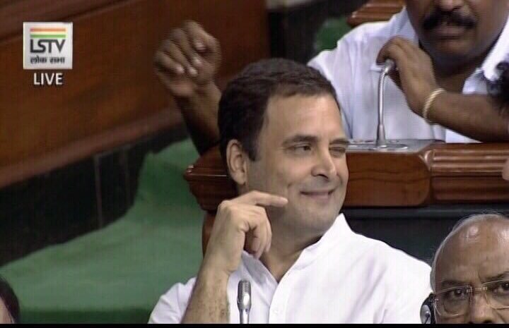 Rahul Gandhi winks after hugging PM Narendra Modi in Lok Sabha #NoConfidenceMotion