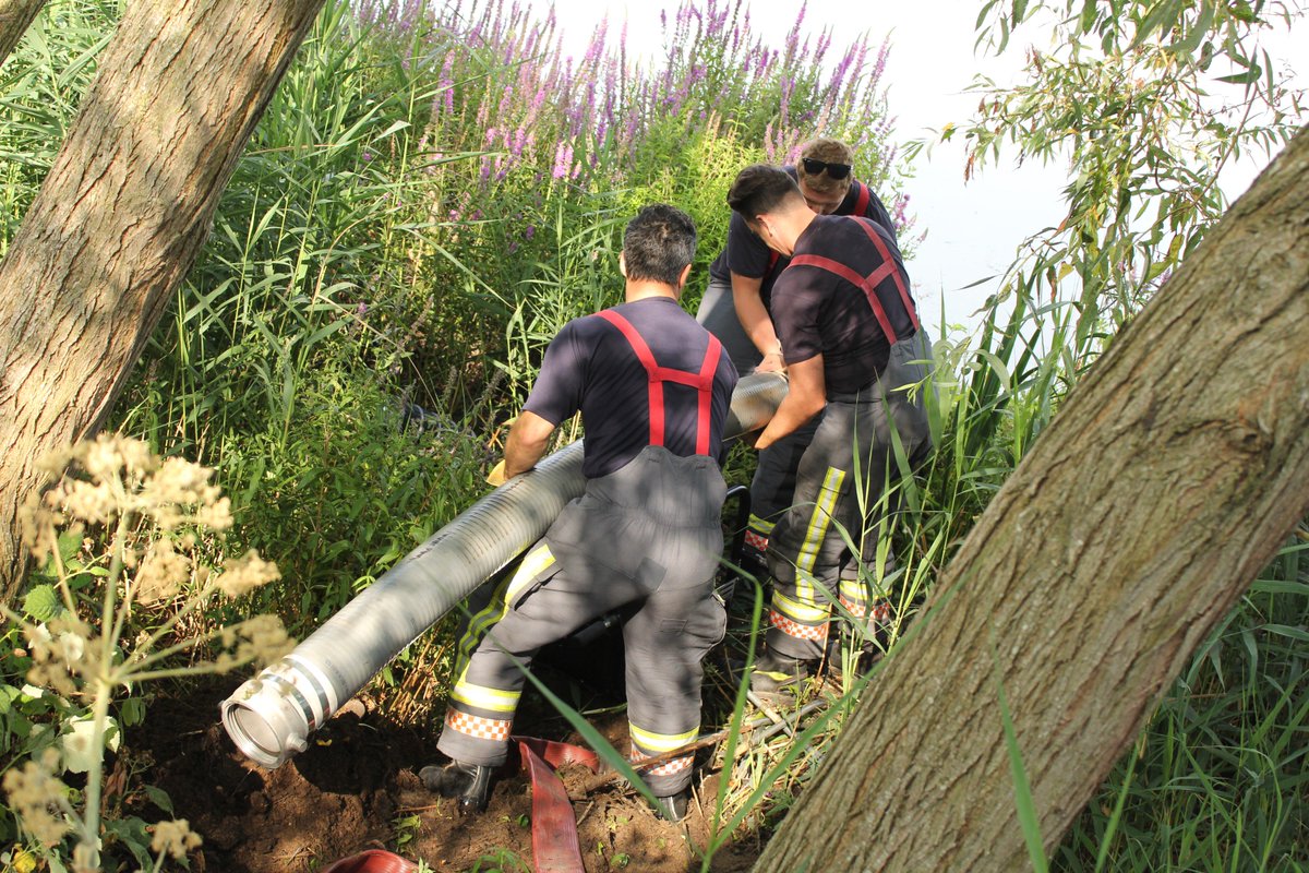 AttenboroughNR's tweet photo. Our huge thanks goes out to #RedWatch from @nottsfire #HighfieldsFireStation in Beeston for helping us save our wildlife pond. Using a portable pump to refill the pond with water from the adjacent lake, they completed in half an hour what would have take a day of volunteer time! https://t.co/GbYzEzJEv7