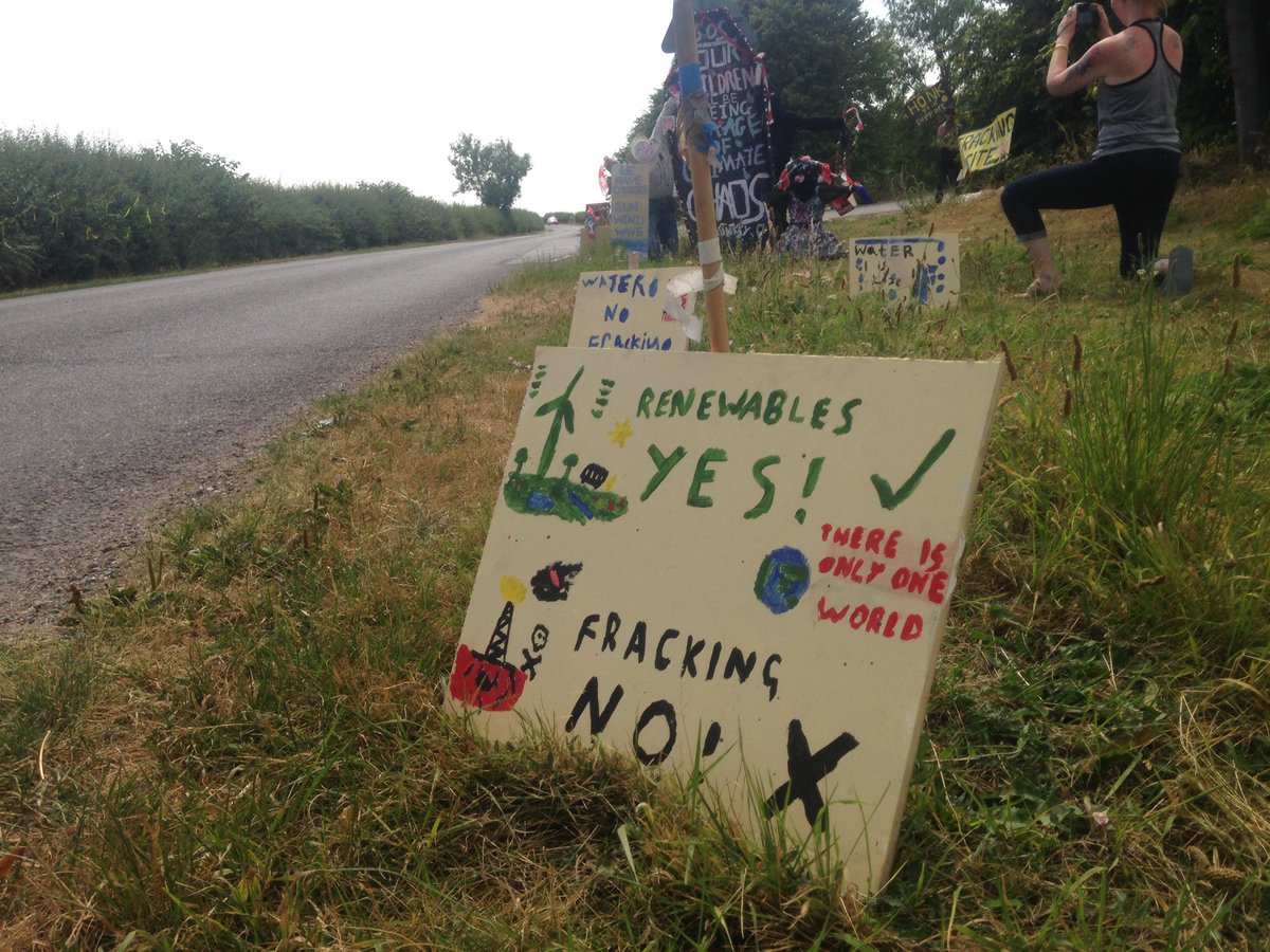 A_N_Squirrel's tweet photo. #artisprotest looks like #Junksy the sustainable banksy has dropped another #antifracking instillation at #tinkerlane #fracking site "kids against fracking"  a collaboration with local kids! #saveourfuture #wesaidno #community #peacefulresistance #riseup https://t.co/EIHgw5LarM