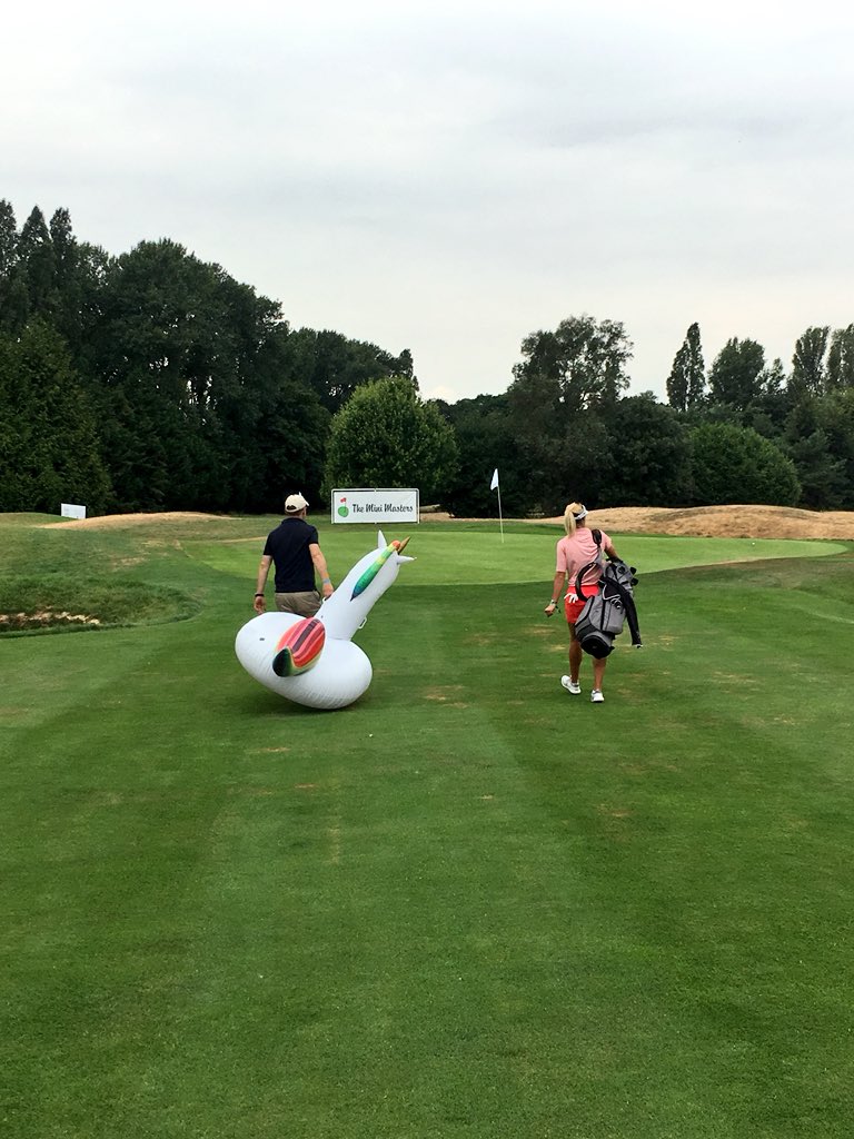 MiniMastersGolf's tweet photo. Meanwhile, @CarlyBooth92 is heading out to her tee with just the essentials... #MiniMastersGolf https://t.co/I5eG1UIfce