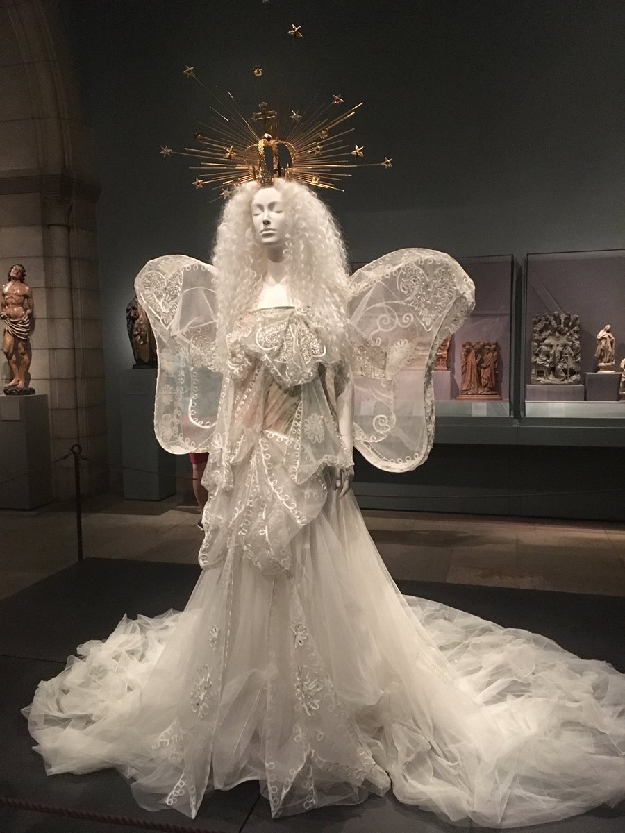 FGIDC's tweet image. We finally made it to the @metmuseum for Heavenly Bodies: 
Fashion and the Catholic Imagination. This exhibit truly blew us away. Exquisite designs, attention to detail, carefully crafted ambiance ... this exhibit was the whole package. #nyc #metmuseum #fashion #heavenlybodies