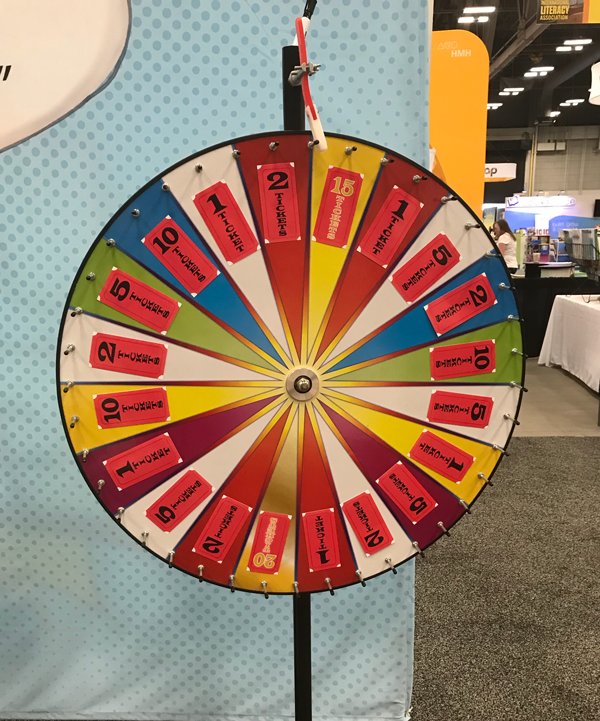 AbramsLearning's tweet photo. Spin the wheel at booth 305 this #ILA18! We are all set up and ready for you to start winning some awesome prizes! https://t.co/5B4SrQlb3g