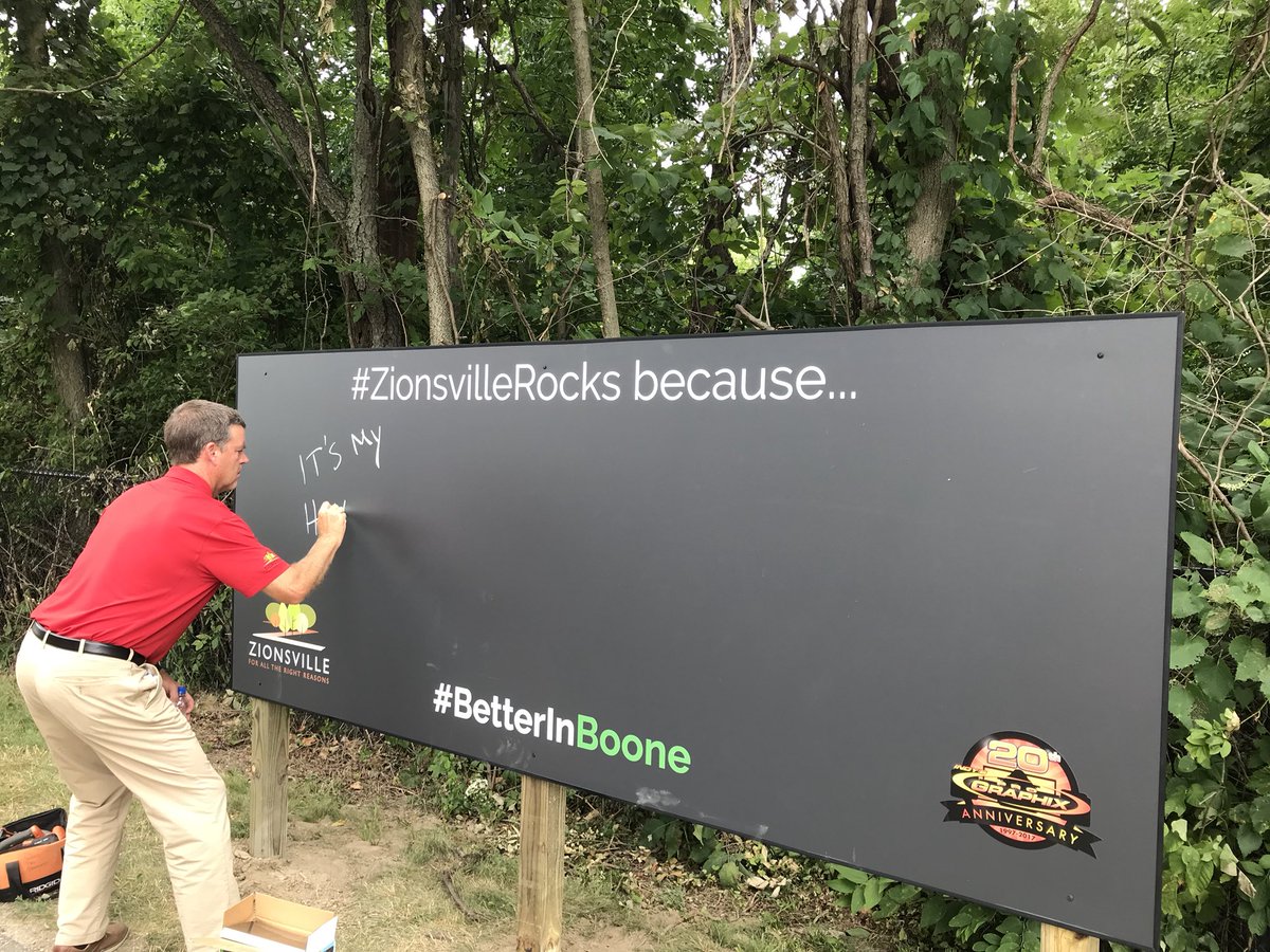 MSBooneEDC's tweet photo. Check out the new public art in @ZionsvilleIN! Write why you think #zionsvillerocks on the board, on the trail outside of town hall! Thank you @IndysProGraphix #BetterInBoone https://t.co/VBAkpHrTCP