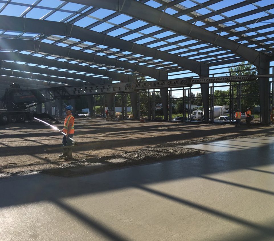 AveiroConstruct's tweet photo. Did you say TWO of FOUR concrete floor pours complete? We did! A whopping 260 meters of concrete poured and another 940 meters to go before completion - That's some progress! @JMartinSpeedy #concrete #pour #metersonmeters https://t.co/NpnhcDDULz
