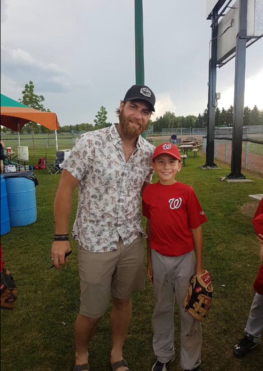 A very happy Eli Hansen with Braden Holtby 
( Stanley Cup goalie)