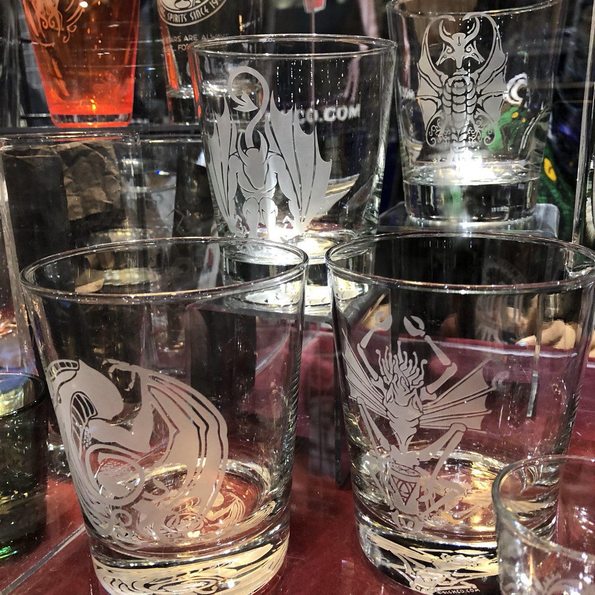 ArkhamBazaar's tweet image. Set of 4 #Cthulhu Mythos #hplovecraft whiskey glasses, featuring Cthulhu, a Mi-go, Elder Thing, and a Nightgaunt. Exclusively at #SDCC Booth 523. #cthulhumythos