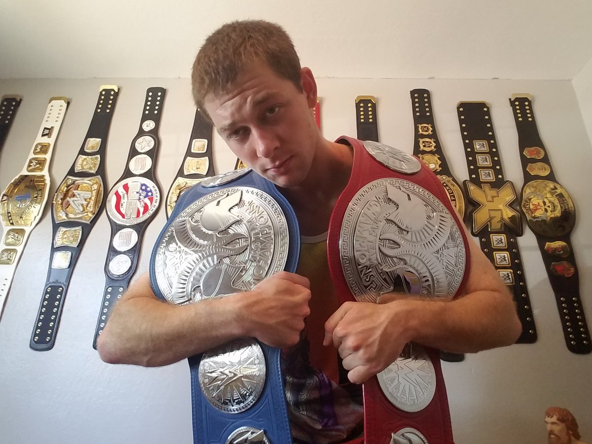 JacobHoward2425's tweet photo. My Two Newest Belts! #Raw and #SDLive Tag Team Titles!! @WWEShop @WWE #BURRITOSNATION #BELTADDICT https://t.co/NaRWMmwYo7