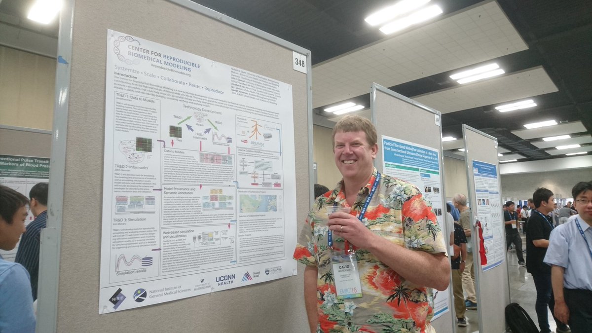 andreshouse's tweet photo. Gotta love a conference where you can present your poster in a Hawaiian shirt and drinking wine! #EMBC2018 https://t.co/YpC4puvmLd