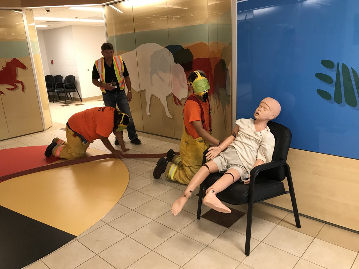 SaskMiningAssoc's tweet photo. For #Search&Rescue event #YouthResponders had visors taped to simulate low visibility in smoke-filled room. They crawled on floor, feeling walls and hose to rescue #FakeChild- #GreatCommunicationCaptain @SaskatoonFire @SSRMining @StoonTribalCncl @whitecapschool https://t.co/OPd8gHjV7x