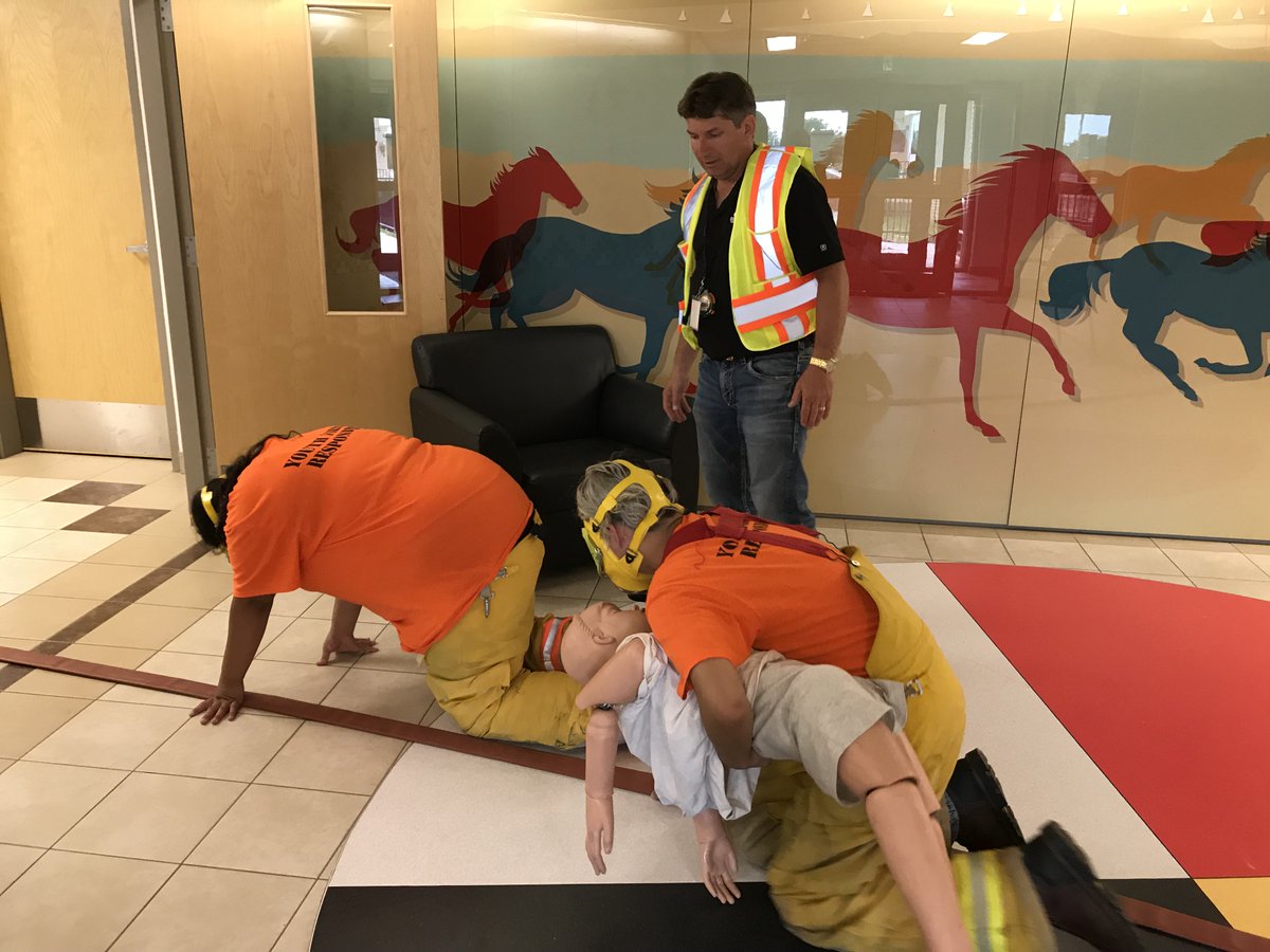 SaskMiningAssoc's tweet photo. For #Search&Rescue event #YouthResponders had visors taped to simulate low visibility in smoke-filled room. They crawled on floor, feeling walls and hose to rescue #FakeChild- #GreatCommunicationCaptain @SaskatoonFire @SSRMining @StoonTribalCncl @whitecapschool https://t.co/OPd8gHjV7x