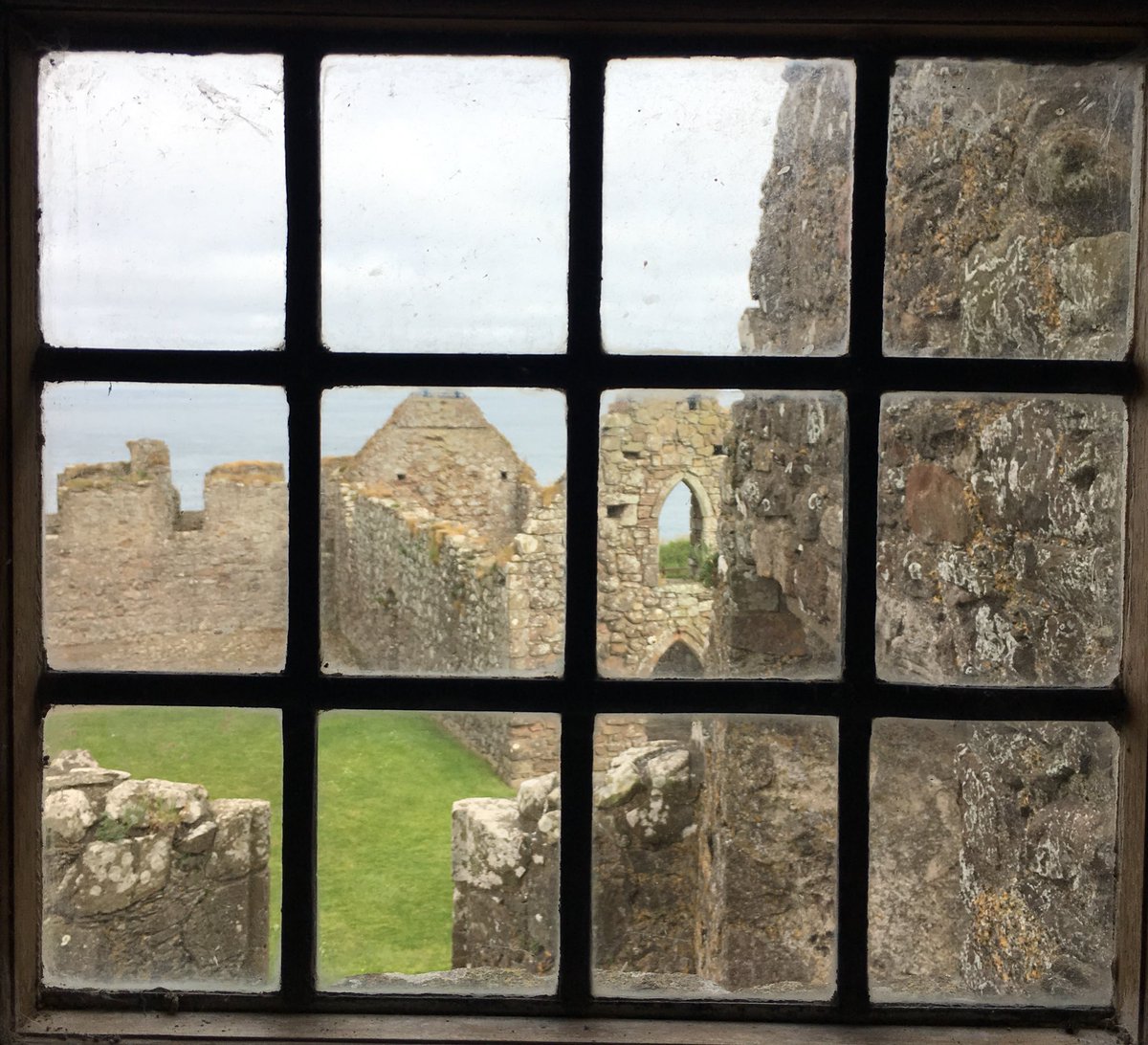 castledunnottar's tweet photo. Here is a view of the chapel that not many get to see. A #hiddenview from inside the Silver House. This version of the chapel has been standing since the 1500’s however the first church was consecrated on the castle rock in 1276. #ScotlandIsNow @visitabdn @VisitScotland https://t.co/y3qtemPrCL
