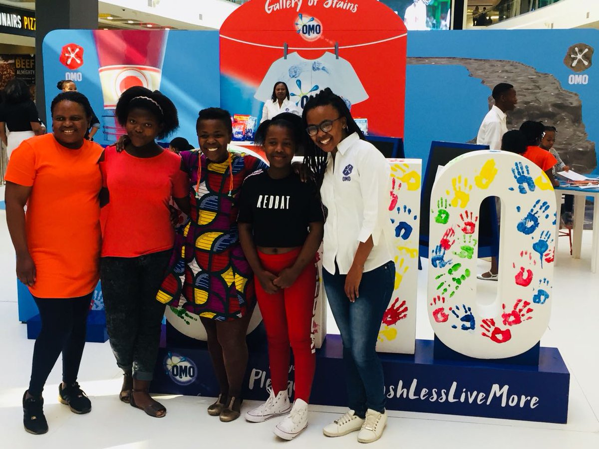 OMOSouthAfrica's tweet photo. You’re invited to join us at the OMO Gallery of Stains in Baywest Mall, Port Elizabeth today. Pop in NOW until 1pm for some great fun activities with @zolanimahola. You can also pledge to #WashLessLiveMore with your hand print. 🎨🖌 https://t.co/BW803IeQhb