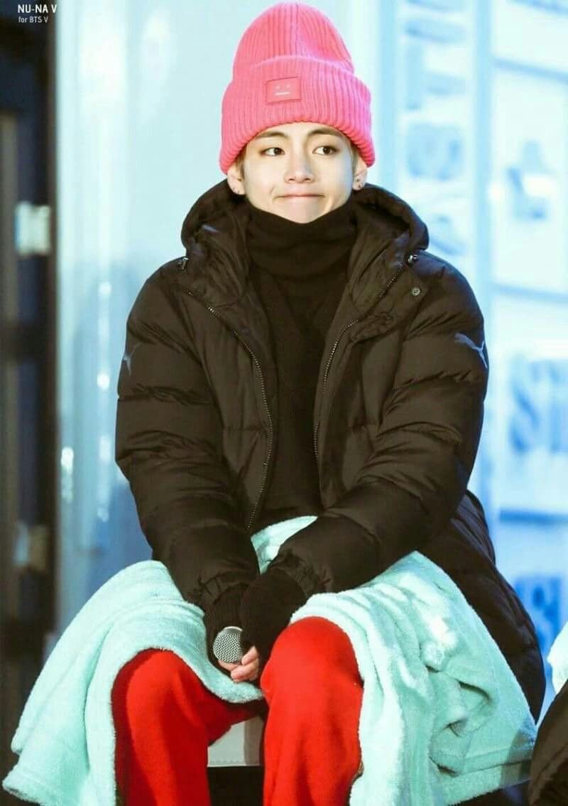Taehyung wearing a cute pink beanie 