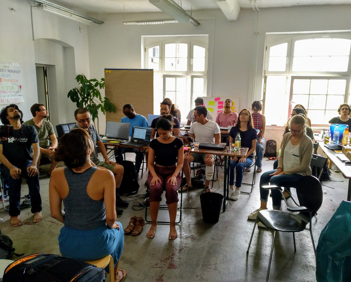 theaiscope's tweet photo. Renata Augusto guides us through a yoga session before we break for lunch, to hydrate muscles, relieve tension and relax! https://t.co/DjXvPCtH7X