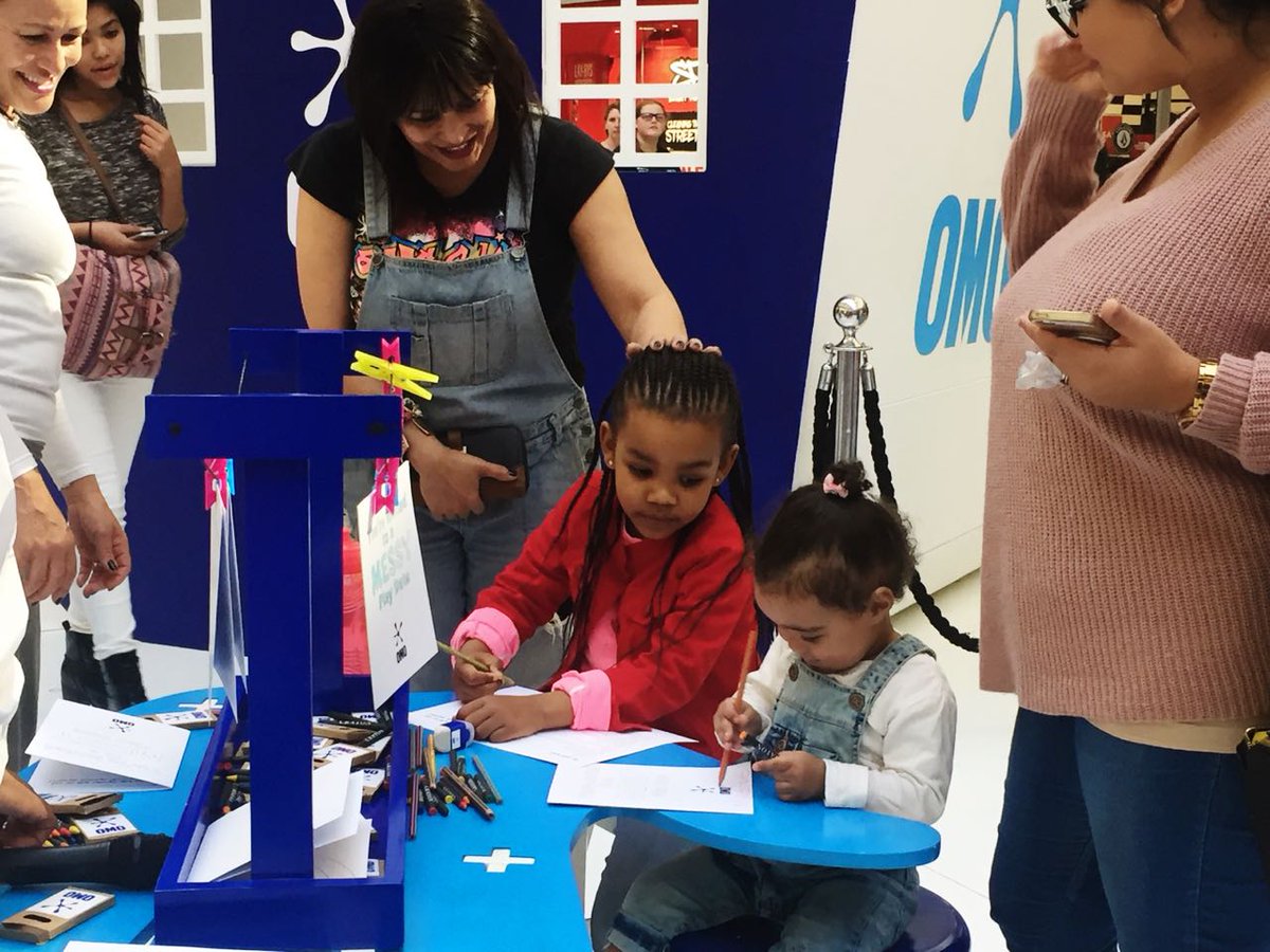 OMOSouthAfrica's tweet photo. Happy faces all around and little ones channeling their creativity at our OMO Gallery of Stains. Join the family fun and pledge to #WashLessLiveMore. https://t.co/mppckXnlaN