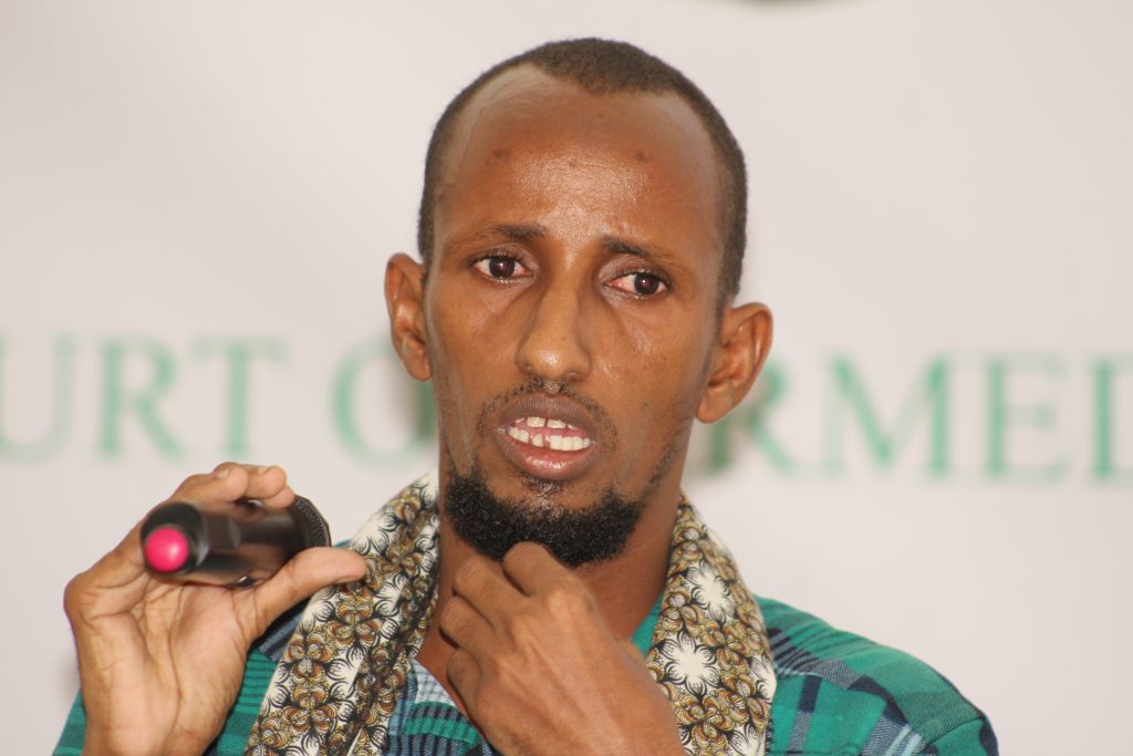 RadioDanan's tweet photo. The #ISIS cameraman in #Somalia appears on court in #Mogadishu today. #Jama_Hussein_Hassan has been a member in Al-Shabaab since 2013. #Jama_Hussein who confessed his membership in #ISIS is  expected to face justice.#Somalia. https://t.co/xQWvB1RvcH