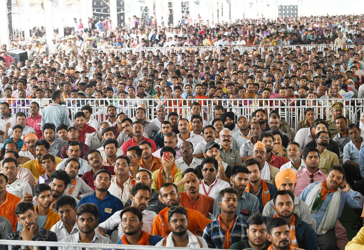 narendramodi's tweet photo. People joined us in large numbers at the rally in Shahjahanpur. 
Spoke about the Government’s efforts in agriculture, steps for the welfare of sugarcane farmers and yesterday’s no-confidence motion which once again brought out the Opposition’s opportunism. https://t.co/zZrMAJToUt https://t.co/cEShRurgYD