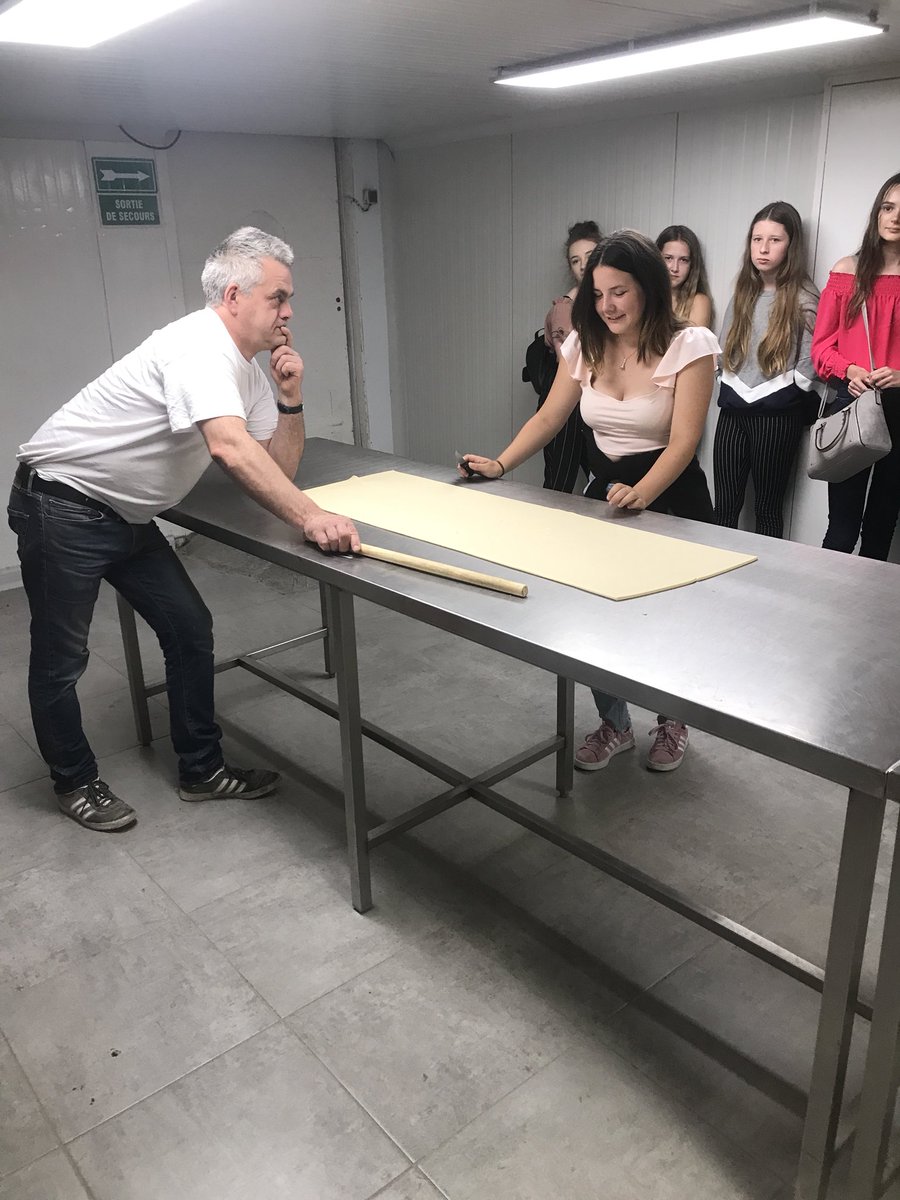 BuilthHS's tweet photo. Year 9 and 10 Pupils have been put on the spot this morning, a little bakery lesson in French with a very entertaining French baker 😂👍🏻🇫🇷 #Boulangerie #BWHSontour #Paris #croissantmaking https://t.co/8ZsyiuQORo