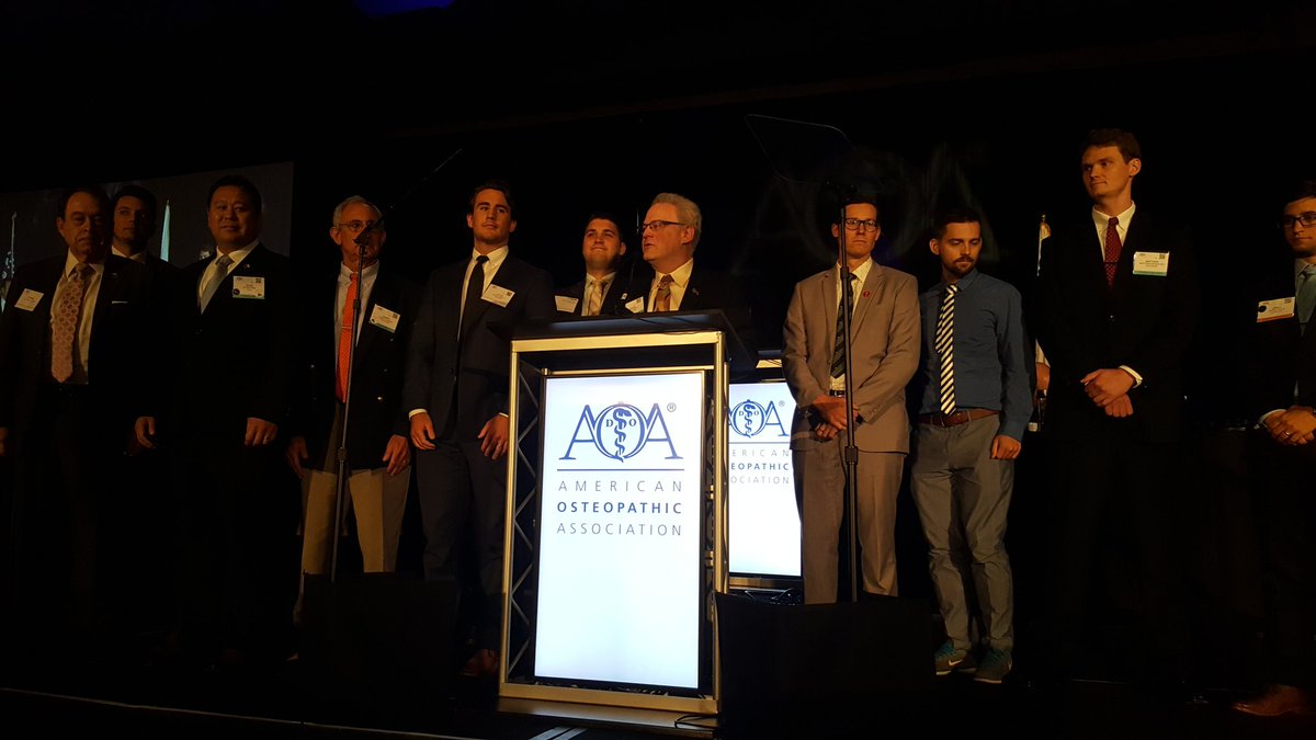 Clint Adams, DO, receives the STAR Award on behalf of Rocky Vista University COM #AOAHoD