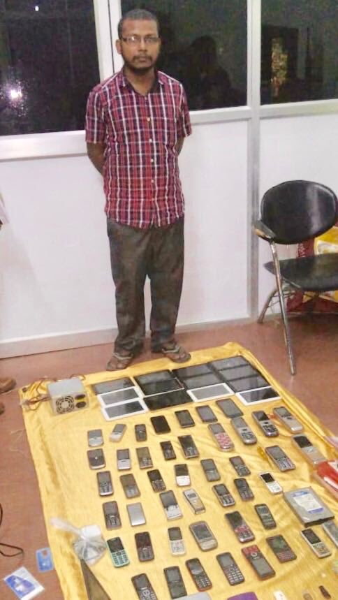 assampolice's tweet photo. Suleiman Ibrahim Ali of PS Hatigaon area arrested for opening fake Face Book accounts of 17 Sr Police Offrs. 

47 Mobiles, 13 Tabs &amp; 15 Sims recovered. 

Panbazar PS Case 341/18. Further probe on. 

Kudos to Guwahati Police Crime Branch.  

#CyberCrime #CyberSecurity #AssamPolice https://t.co/RbnhtBHexW