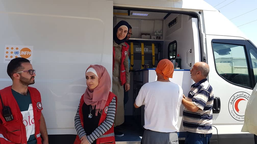 max_f_diana's tweet photo. Response #Jibreen Shelter for #Kefraya #Foua evacuations. Partners @SARC_Aleppo #MSJM providing #ReproductiveHealth #GBV #PsychoSocial services & distributing kits. "When I arrived I was very afraid; thanks to the services & care I now feel she safe." A woman said #Syria #LNOB https://t.co/Cl11DB6FfJ
