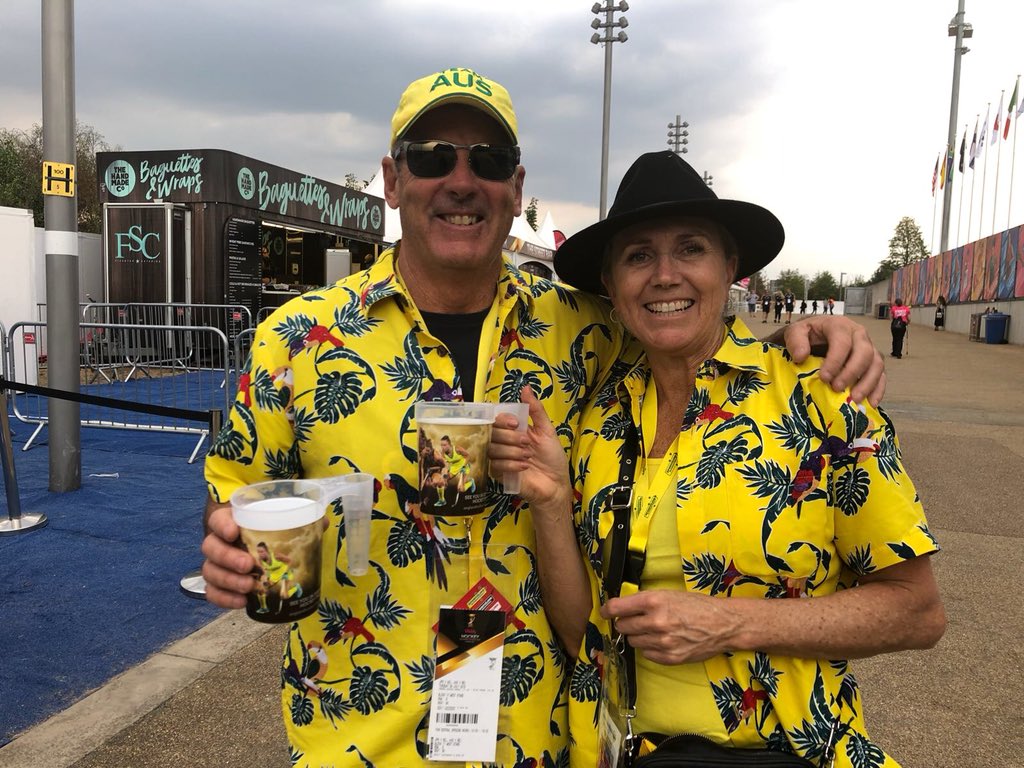Hockeyroos's tweet photo. Awesome green-and-gold support from Madison &amp; Savannah Fitzpatrick’s parents!! #HWC2018 #Roovolution 🇦🇺💛💚 https://t.co/m1SzLiCdVt