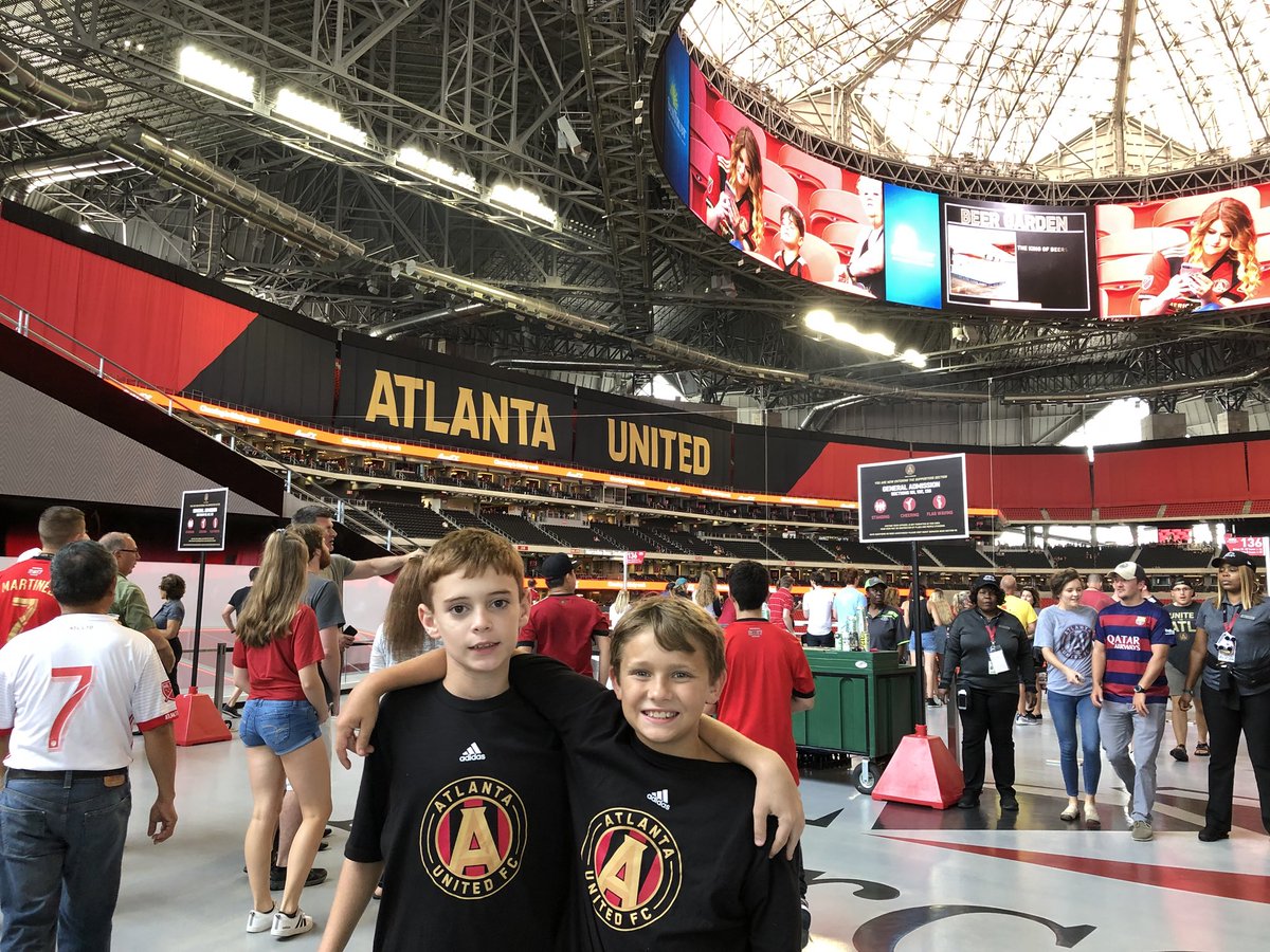 wrbspearpoint's tweet photo. First professional soccer game with these two boys @atlutd . Colby and I even got a few swings in @pgatour store before going to our seats #kingpeach #colbyman #jaymeister #battleoftheuniteds https://t.co/EMnrDZ2q9e