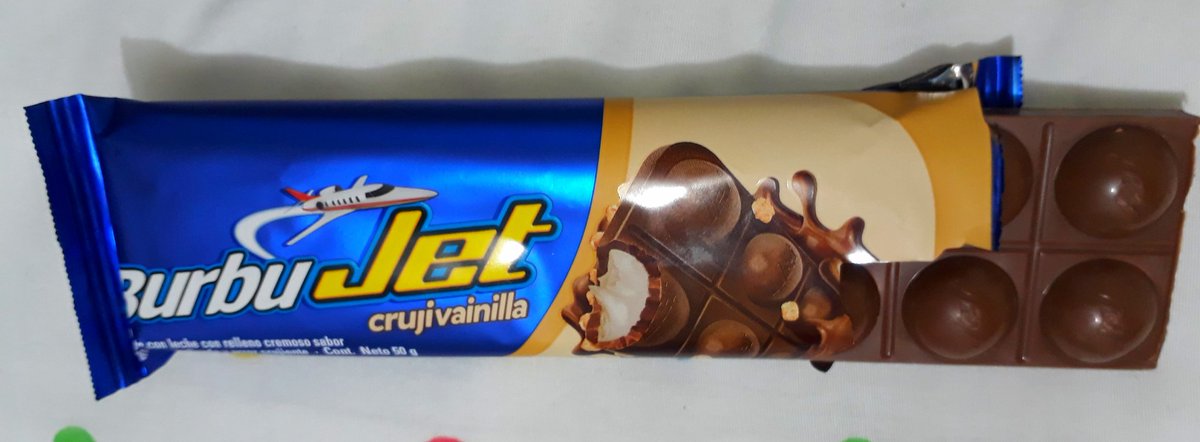 Adriau's tweet photo. @chocolatesjet 🛫Jet, literalmente, me pusiste a 'volar'  con esta nueva creación. Un pecadito de muerte lenta 😱
¡Qué deliciaaa! 
🍫 BurbuJet crujivainilla 😋😋
#chocolatesjet https://t.co/nsU6GYi3D7