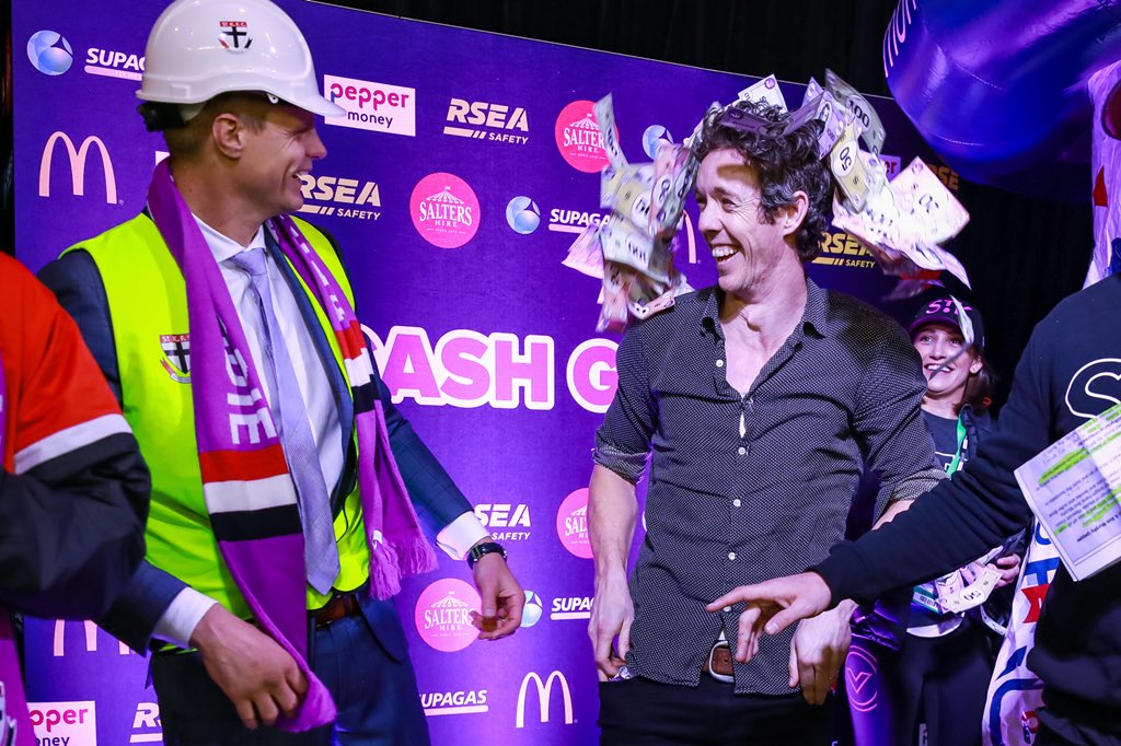 MikeTarrPhoto's tweet photo. @BobMurphy02 new hairstyle? Raising much needed funds for @MaddiesVision at the Cash Grab Booth during Maddies Match on Friday Night. Amazing effort with $1,460,000 pledged on the night! 💜💜 https://t.co/bIHvqDHEIm