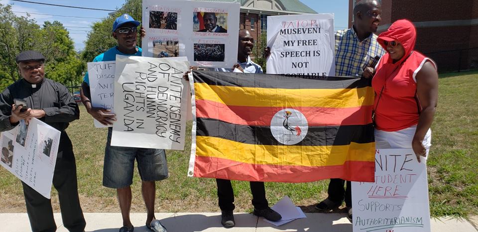 ug_edge's tweet photo. Demonstrations against the presence of a #Uganda-n minister Evelyn Anite in #America on Saturday raged in Boston.

Martin Byakuleka, the president of #CLOUD, who planned the protests, wants Fletcher School to dismiss Anite "queen of intrigue" https://t.co/09216Z4PbE #AgeLimit https://t.co/g2hBULy9kW