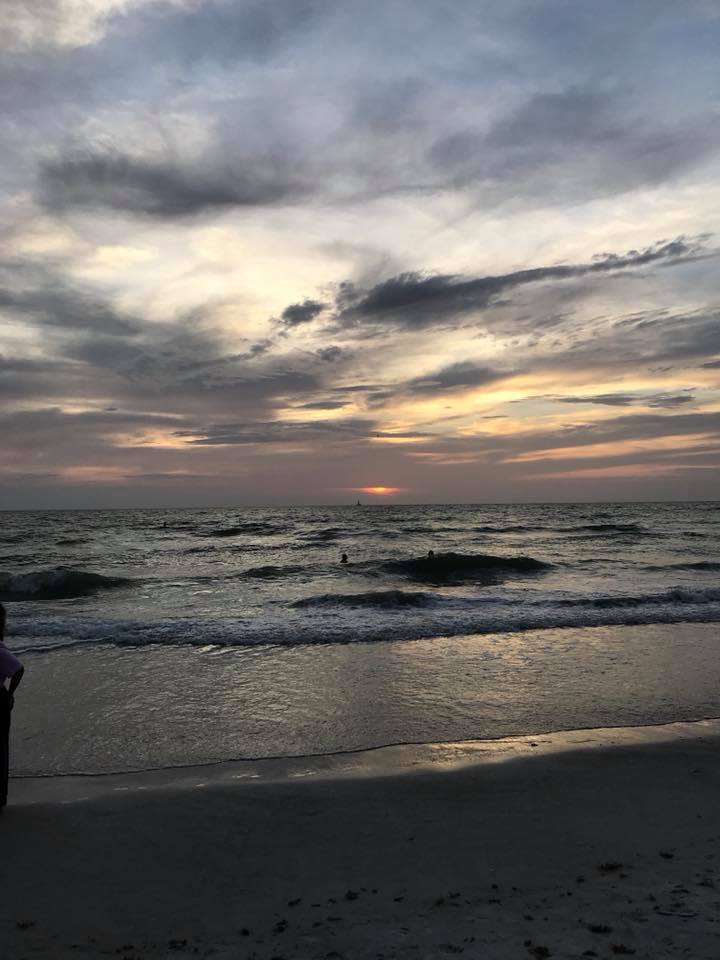 ParrFoundation's tweet photo. Meanwhile, we watched a wedding a beautiful sunset last night at Indian Rocks beach. The sun came shining through right before it set. https://t.co/MXfz4w85Sb