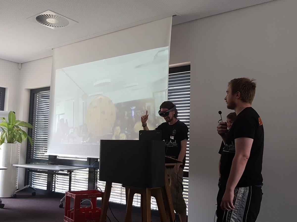 dohack_io's tweet photo. Team "AR Cookie Factory" presenting their idea about playing the game "Cookie Clicker" in #VR with the #Microsofthololense at their #1st #Hackathon @adessoAG #DoHack2018 WOW!!! https://t.co/pqkyicR7EM