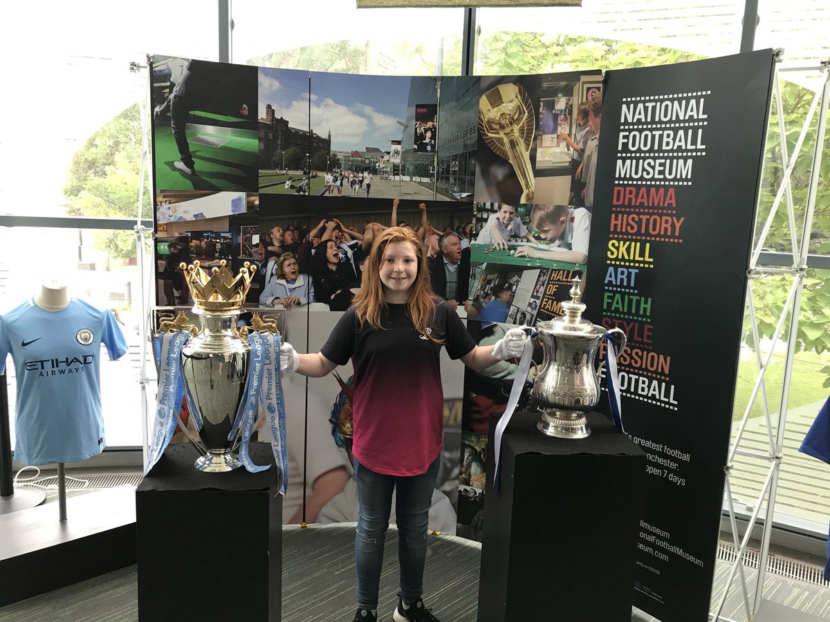 ALionesses's tweet photo. One of our own @ALionesses loving her photo with the Premier League trophy &amp; FA Cup https://t.co/zYmwhX9BwA