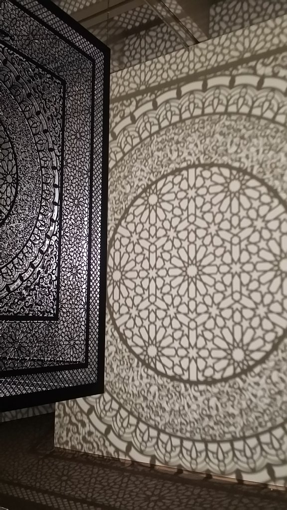 AFunderburkArt's tweet photo. Saw the extraordinary exhibit You Are Here: Light, Color, and Sound Experiences #NCMAhere last night! NC has a fantastic asset in the @ncartmuseum. My very favorite work: Intersections, Anila Quayyum Agga. Ethereal, elegant, spiritual, meditative. I could live in this room! #art https://t.co/SK0iEaNOLC