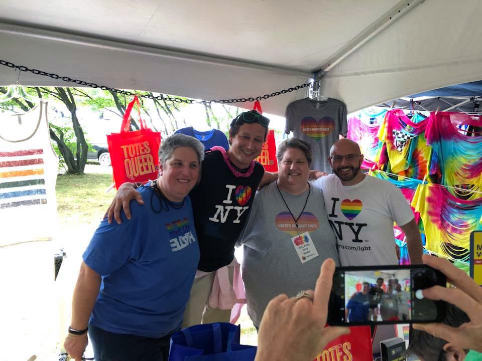 HRC volunteers at the booth during Pride.