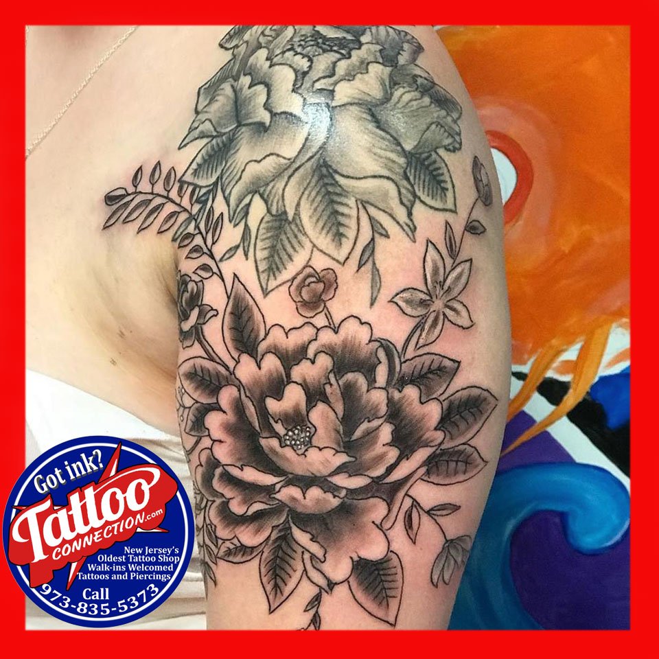 Tatt2Connection's tweet photo. Black and grey peonies the start of a floral themed sleeve tattoo. #TattooedWomen #TattooConnection https://t.co/bFNkQUYeWB