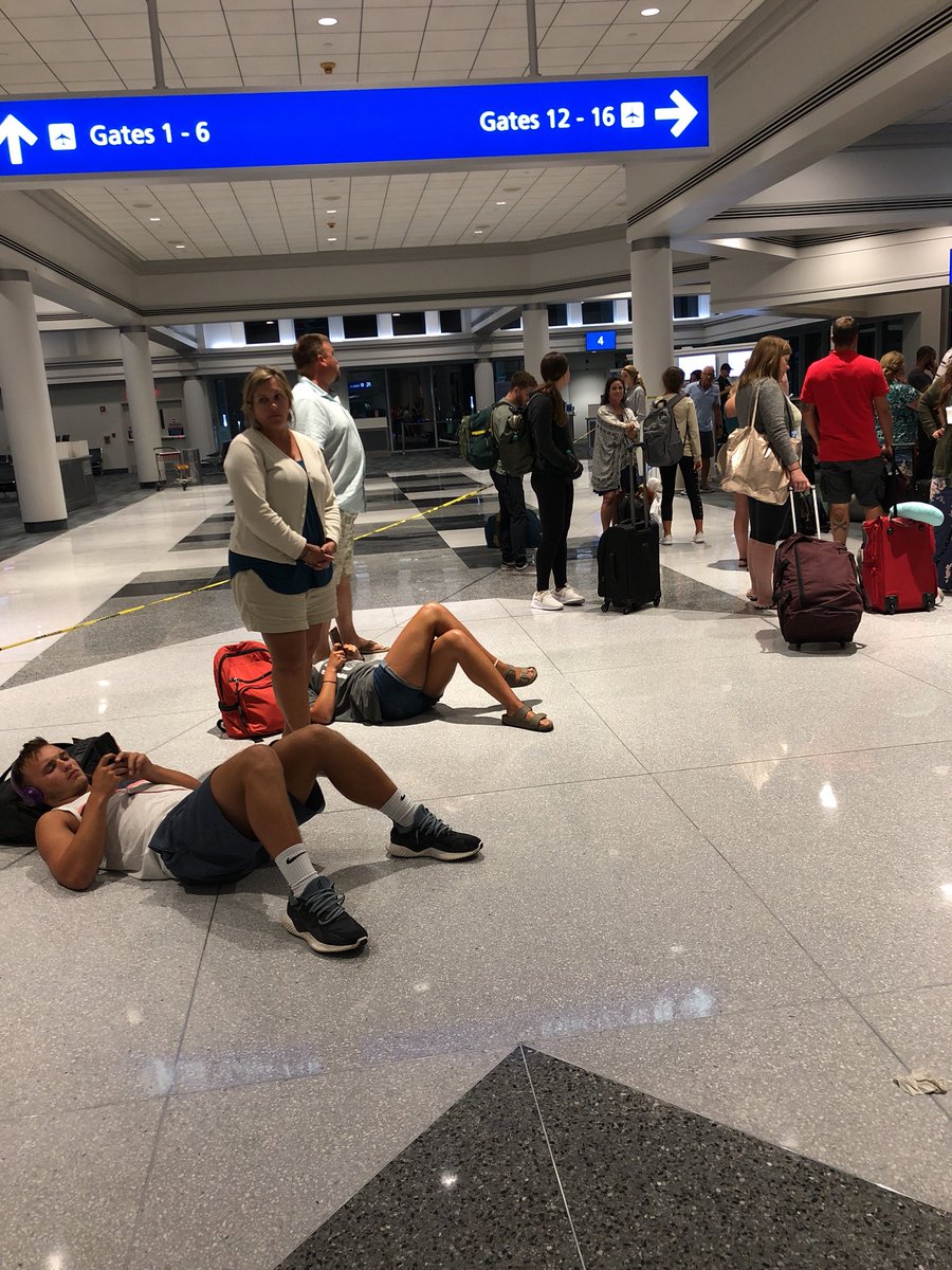 jklein011's tweet photo. @AmericanAir going on hour six of being quarantined and stranded after you diverted us to an airport that doesn’t have any custom operations, at least you finally let us off the plane #passengersof886 #canwegohomeyet https://t.co/lUpDyYoL37