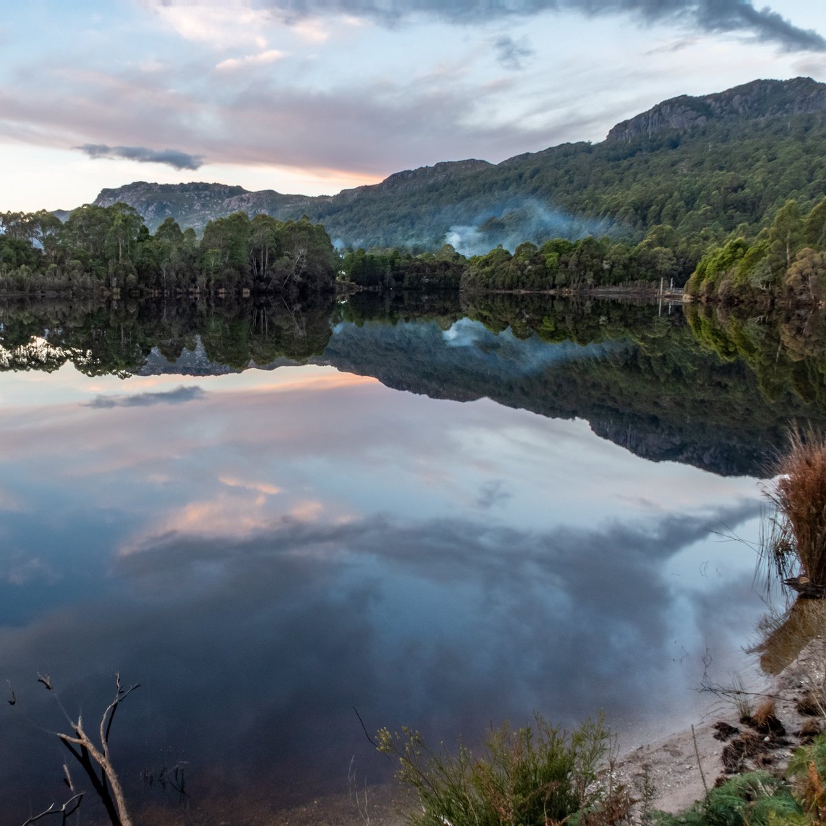 TinDTC's tweet photo. Who can resist taking far too many photos of the sun setting over still bodies of water? This is Lake Rosebery which is a man-made lake in West Tasmania at Tullah.
#tindragoncottages #westcoasttasmania #tullah #lakerosebery . https://t.co/G6ak7LUlnU