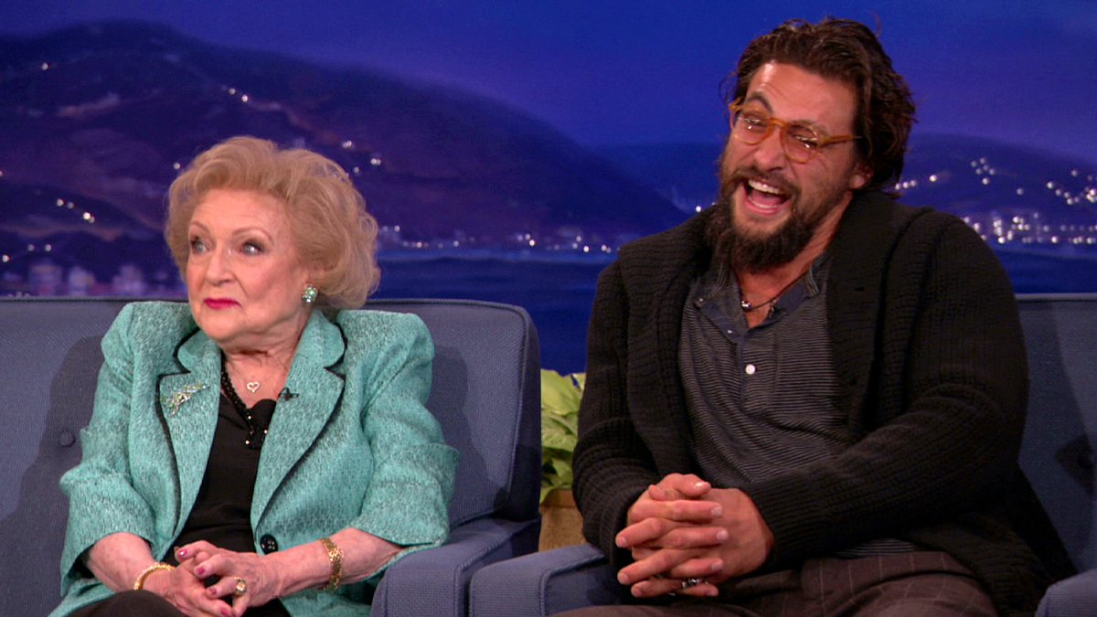 TeamCoco's tweet photo. Previously on #CONAN: Jason Momoa's @MensHealthMag cover left @BettyMWhite speechless. https://t.co/gfbOcJBEag​ #ConanCon https://t.co/2RFDtEPy8W