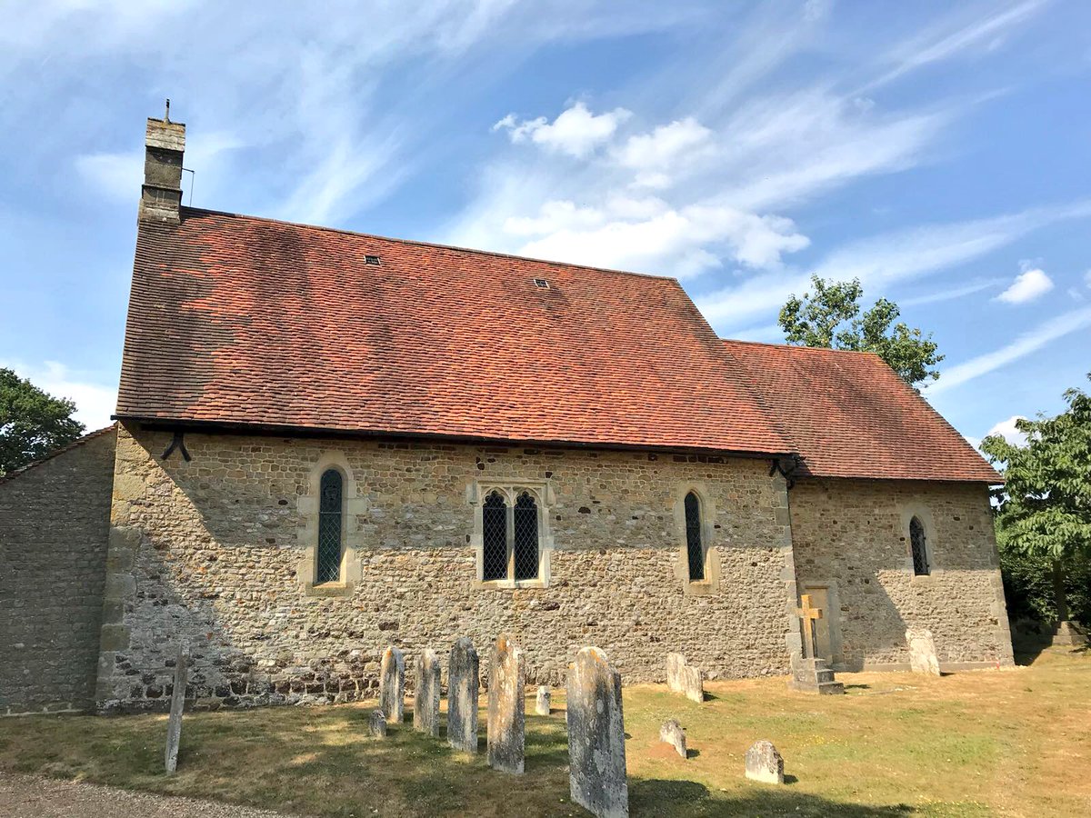 EngChurchPics's tweet photo. St Peter, #Terwick, West #Sussex. The 'Church in the Field' lies alone in fields with a backdrop of the South Downs. St Peter's is a simple C12 church with nave and chancel. Opposite the west door, beneath a yew tree, is the head of a medieval cross. https://t.co/JU9yMyYEM8