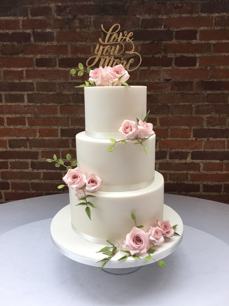 This weekends wedding cake... pink sugar roses and sugar leaves ... a kind of posh boho feel ??? 
thelittlesugarbox.com