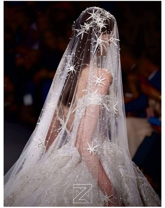 Trend Alert! For 2019 - 2020 we predict a new epic trend for wedding design... Stardust! Shine bright like a diamond in the sky! This is such an astounding veil and gown by <a href="/ziadnakad/">ziad nakad</a> #bridal #stardust #stars #couture #designergown #weddinggoals #weddingdresses #wedding #⭐