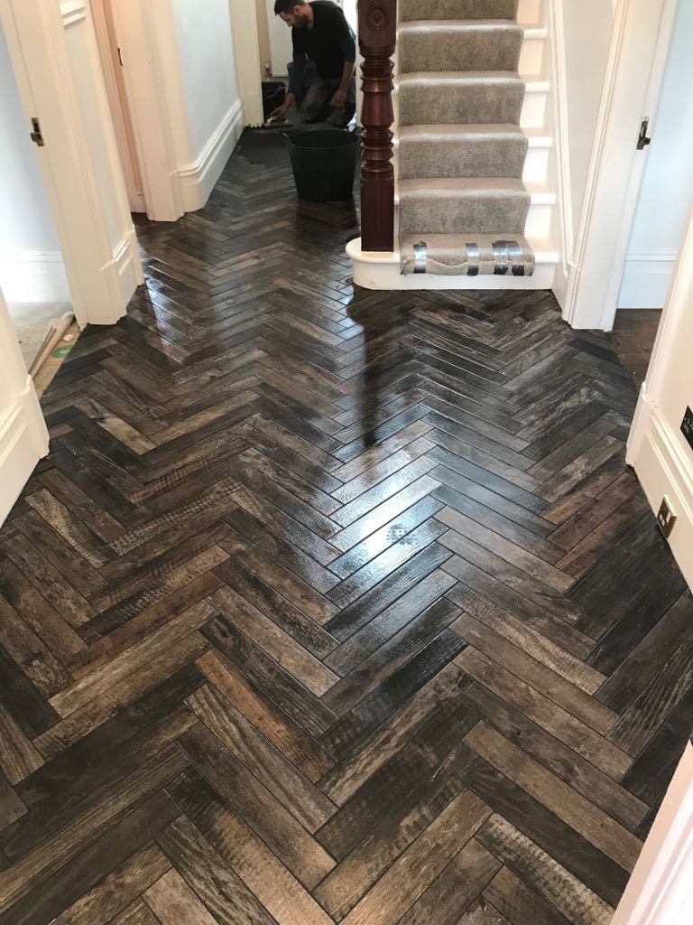 Just finishing off, #woodporcelain #herringbone tiles from <a href="/rocciatiles/">ROCCIA Showrooms</a> complete with @TilemasterTeam <a href="/Dural_UK/">Dural UK Ltd</a> Matting <a href="/DeltaBoard/">David Franklin</a> <a href="/Warmup_Plc/">Warmup UK</a> <a href="/tilers_tools/">Tilers Tools</a> @Rubi_UK_IRE @Scott_kerakoll