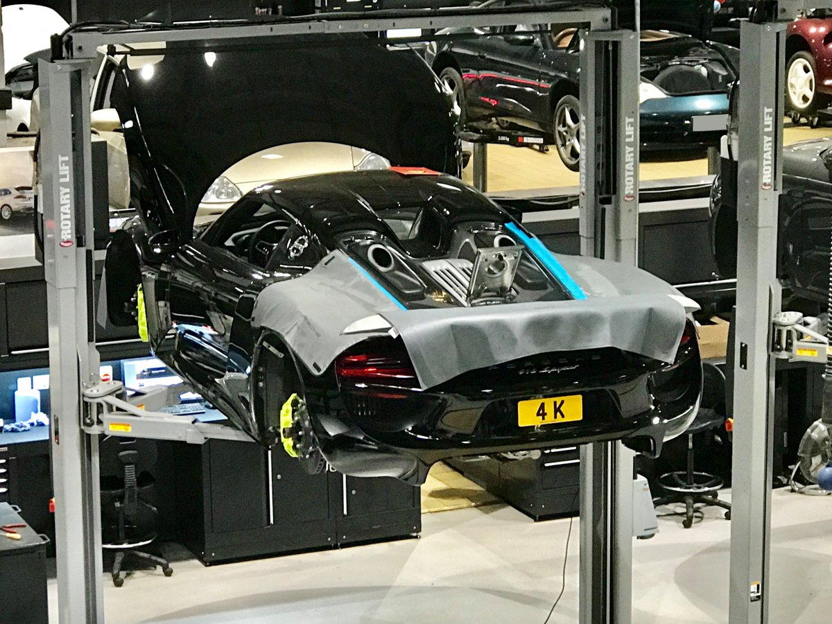 PorscheRetail's tweet photo. From supercar to hypercar, two of Porsche's flagship models together

With Porsche #CentralOperations being the only authorised 918 Spyder &amp; Carrera GT specialist in the UK,, we are delighted to have @afzalkahn 918 Spyder in for a major service – a process which can take 25 hours https://t.co/dDkoxqJDGM