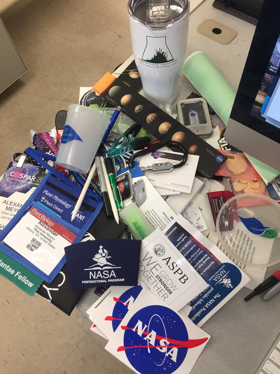 halfbeet's tweet photo. Finally back from a long week of conferences. I saw tons of exciting new science and made plenty of great new connections. Most importantly, I got enough conference swag to last me till next year! #stickersandpens #pensandstickers #plantbio18 #COSPAR2018 https://t.co/lT28VfCiEJ
