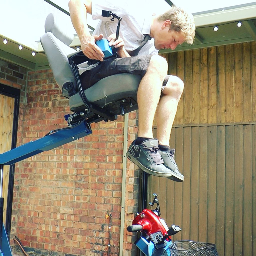 colin_furze's tweet photo. Just checking what’s in the basket.......from above. #furze #workshop #engineering #scooter #pimp #hydralics #craneseat https://t.co/26YPeoRdVN